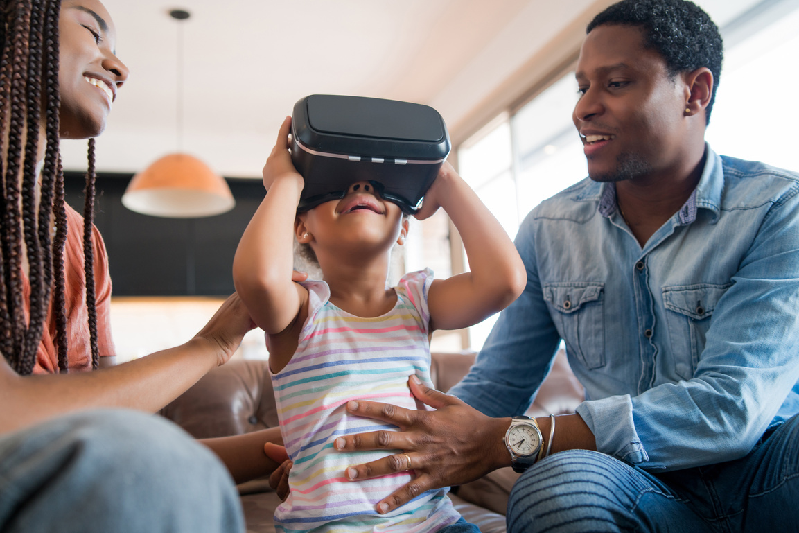 Family Playing Video Games with VR Glasses.